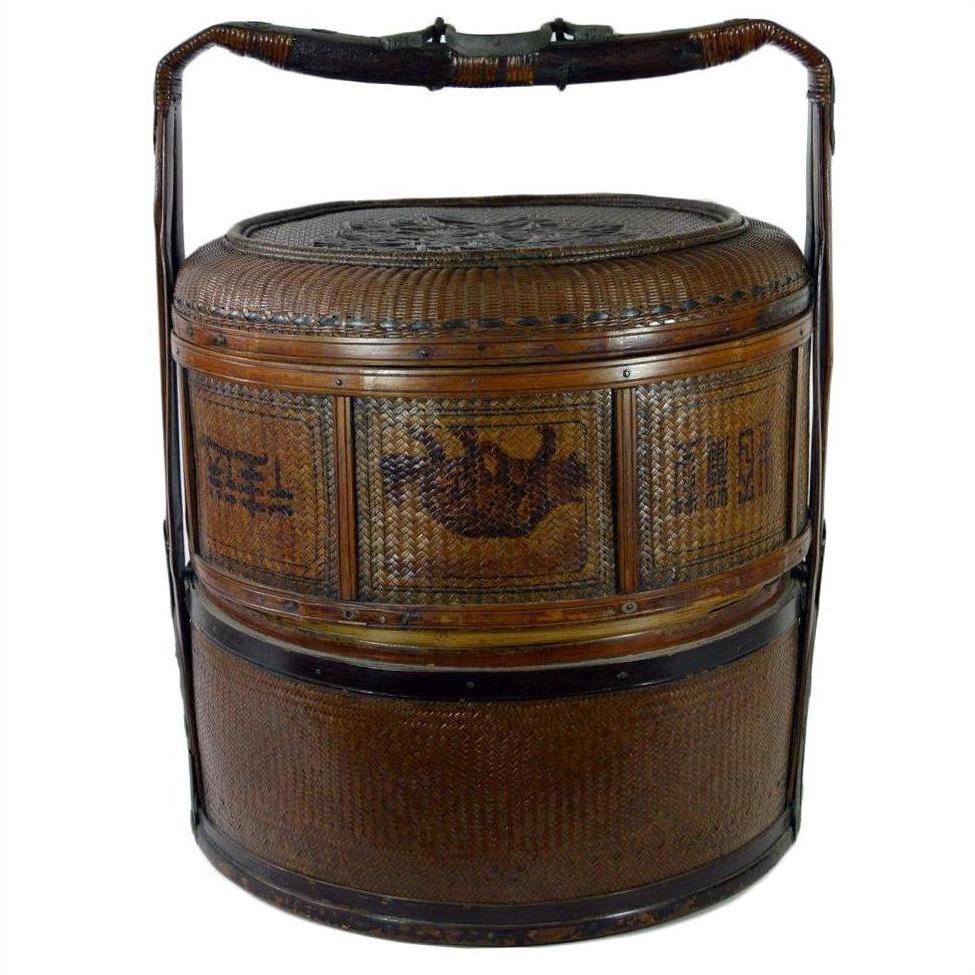 Brown woven bamboo wedding basket with handle and decorative patterns, shown in original good condition.