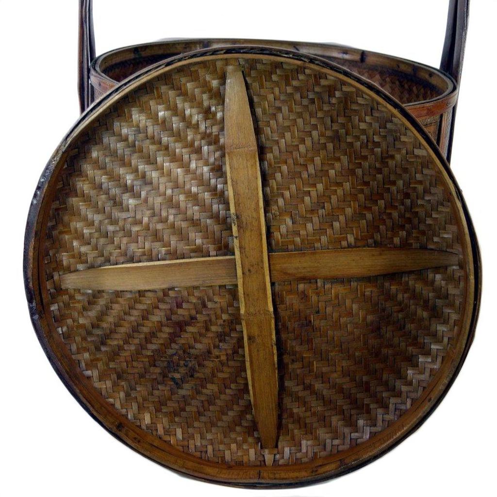 Brown woven wood wedding basket lid with two wooden crossbars, traditional Chinese style.
