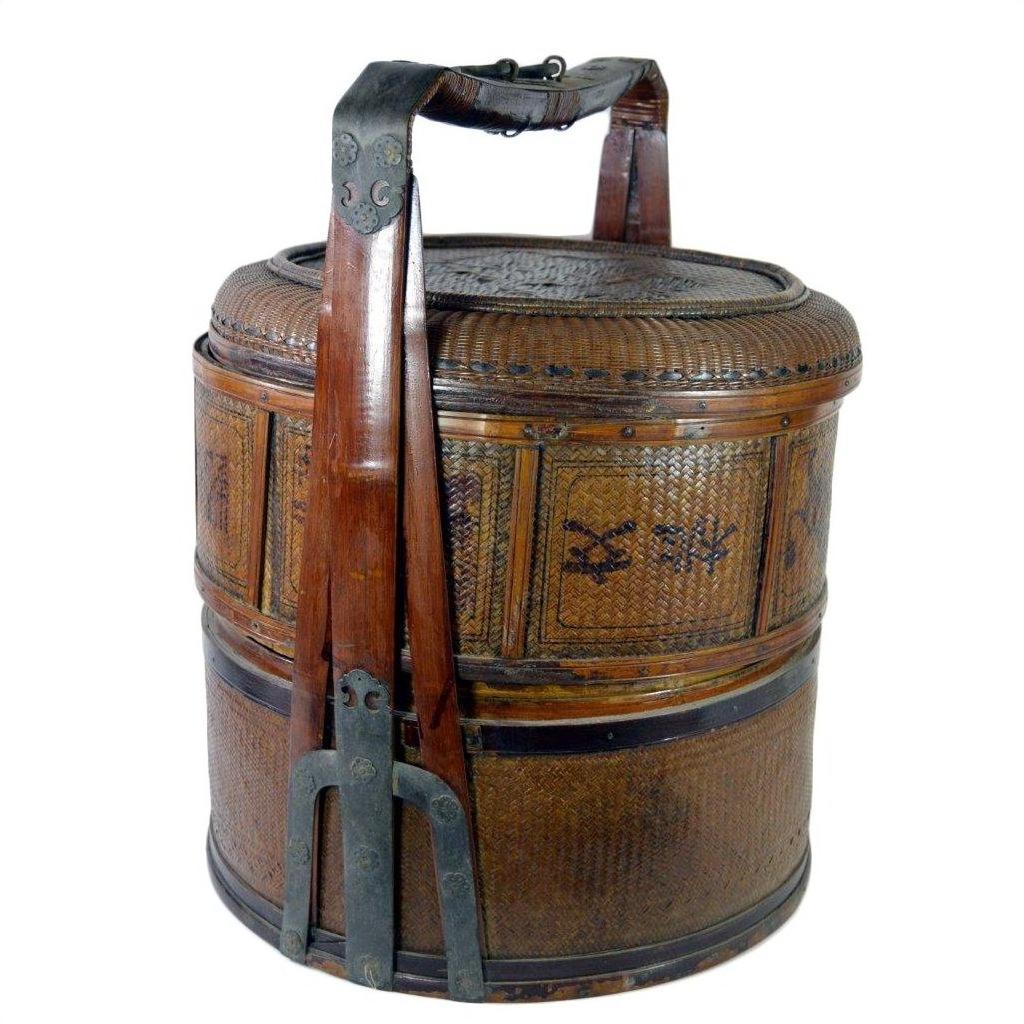 Brown wooden Chinese wedding basket with large handle and intricate patterns, shown in overall good condition.