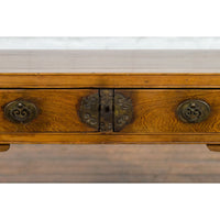 Chinese Late Qing Dynasty Elm Desk with Two Drawers and Ornate Brass Hardware