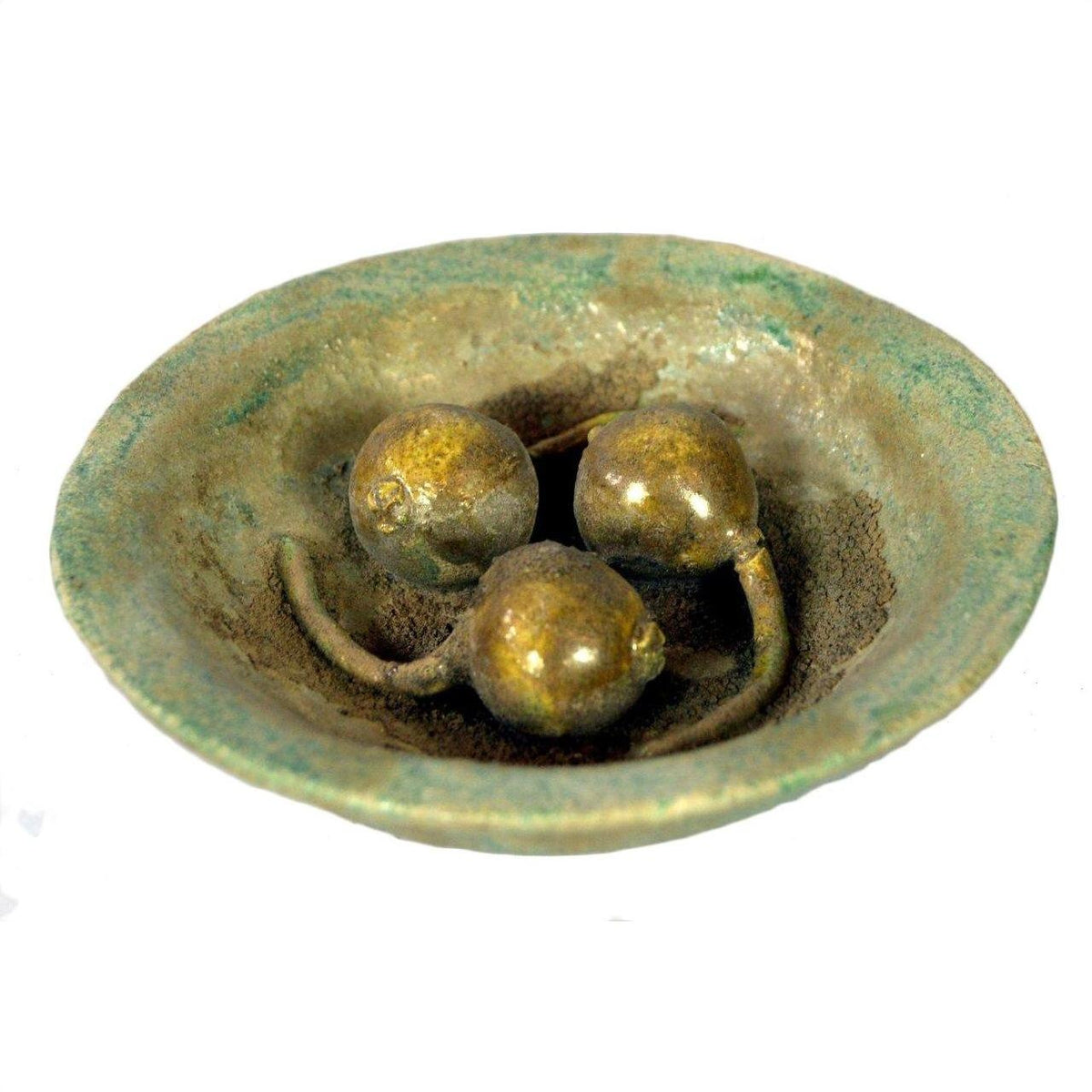 Close-up of three spherical objects with curved stems in a Chinese Ming Dynasty food plate, antique style.