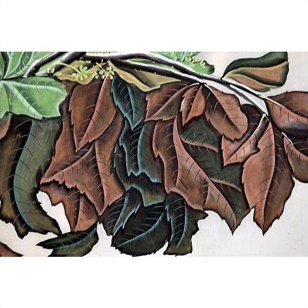 Green and brown leaves, some curled and dry, on silk fabric with a light background.