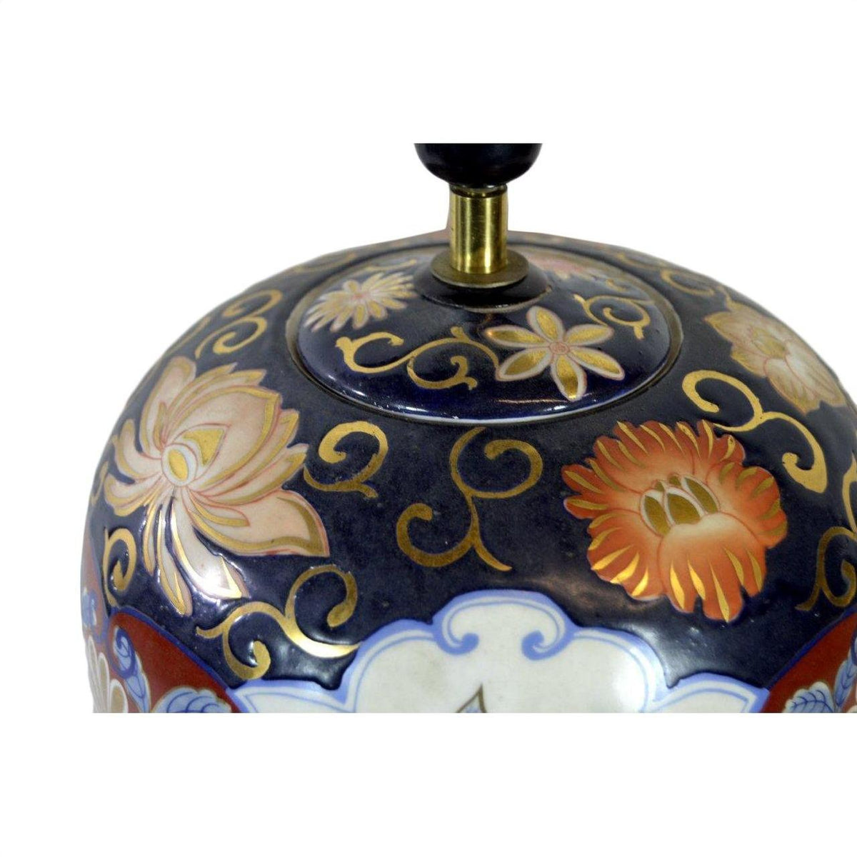Close-up of a dark blue Chinese porcelain electric lamp with gold, orange, and cream floral patterns.