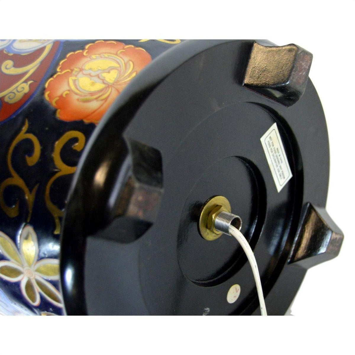 Close-up of a white and blue porcelain electric lamp, ceramic material, in good condition.