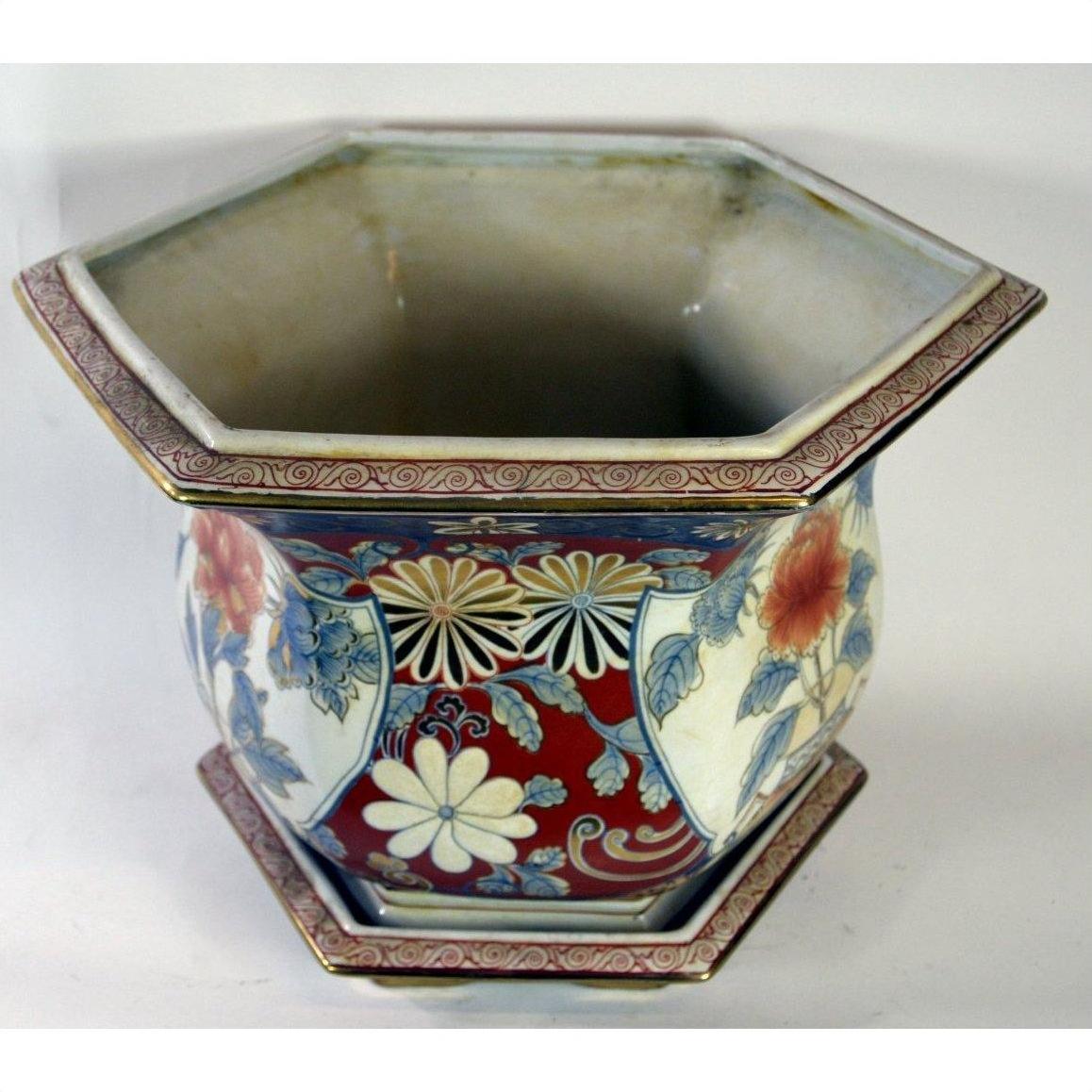 Multi-color floral Chinese porcelain hexagonal planter, hand-painted, on white background, top view.