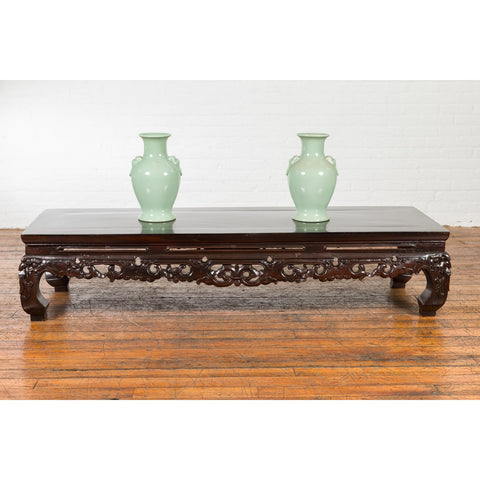 This-is-a-picture-of-a-Chinese Qing Dynasty Low Kang Coffee Table with Carved Apron and Dark Lacquer-image-position-4-style-YN4014-Shop-for-Vintage-and-Antique-Asian-and-Chinese-Furniture-for-sale-at-FEA Home-NYC