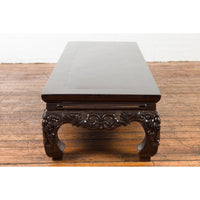 Chinese Qing Dynasty Low Kang Coffee Table with Carved Apron and Dark Lacquer