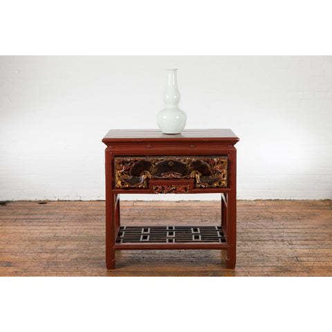 This-is-a-picture-of-a-Chinese Red Lacquered Console Table with Hand Carved Drawers and Geometric Shelf-image-position-2-style-YN6167-Shop-for-Vintage-and-Antique-Asian-and-Chinese-Furniture-for-sale-at-FEA Home-NYC