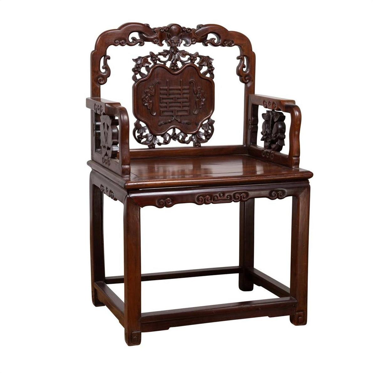 Dark rosewood Chinese chair with intricate carved details, traditional Asian design, 19th century, front view.