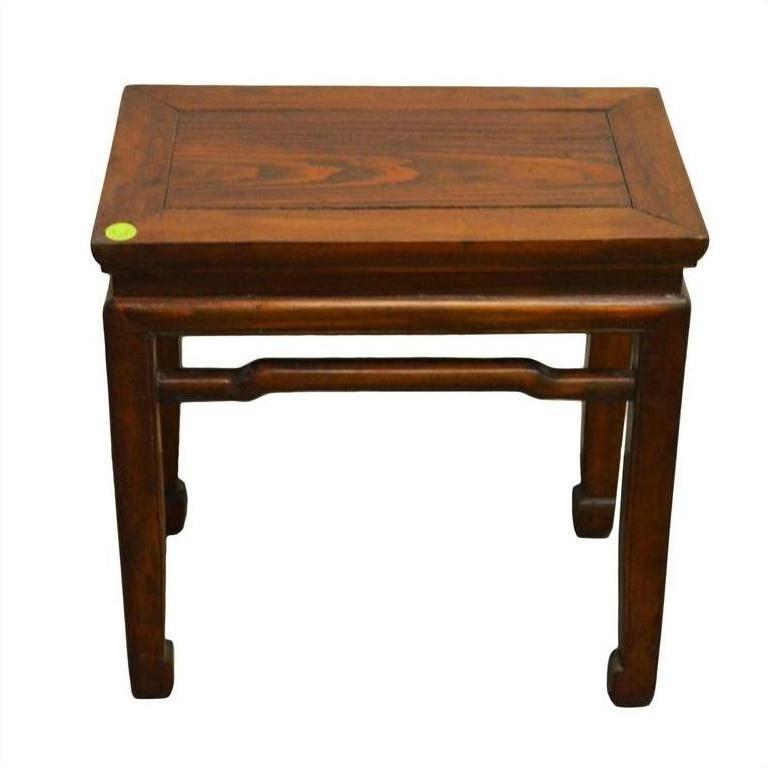Dark wood Chinese side table with four sturdy legs and a rectangular top, overhead view.