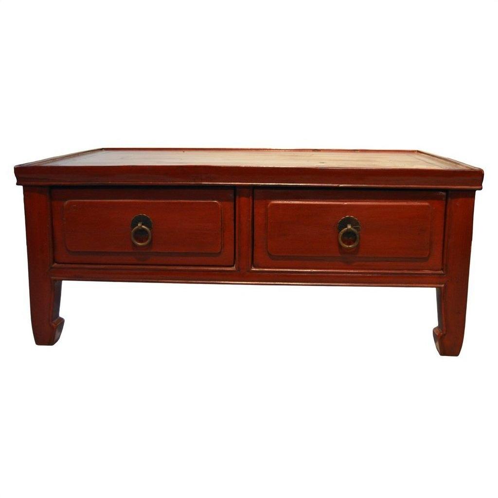 Reddish-brown wood Chinese Low Kang coffee table with two drawers and round metal handles, front view.