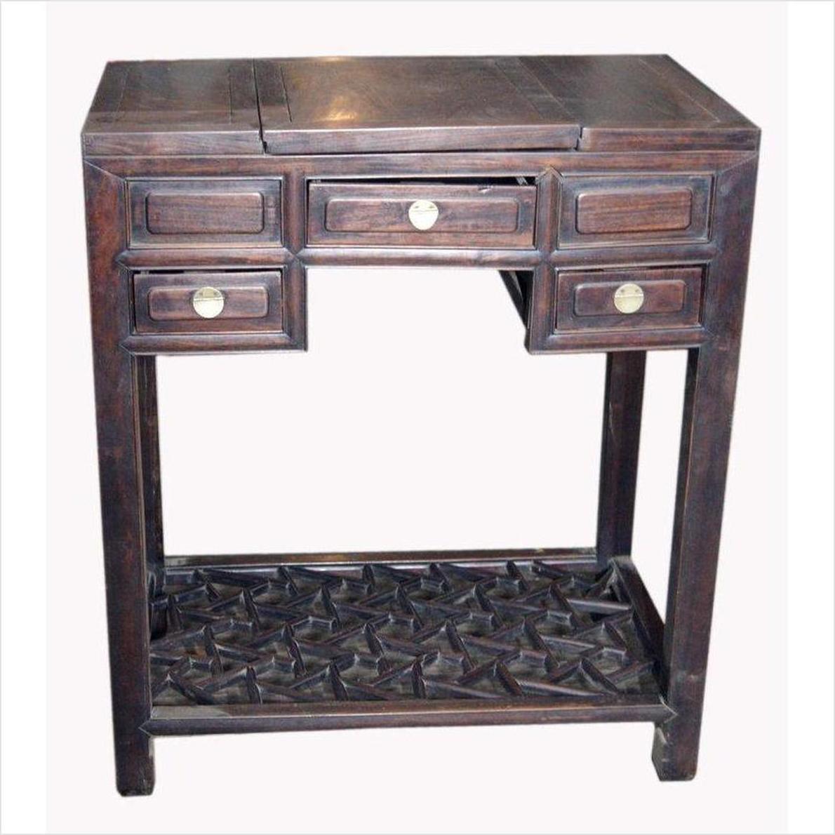 Dark lacquered wood Chinese vintage dressing table with mirror, brass knobs, drawers, and a lattice shelf.