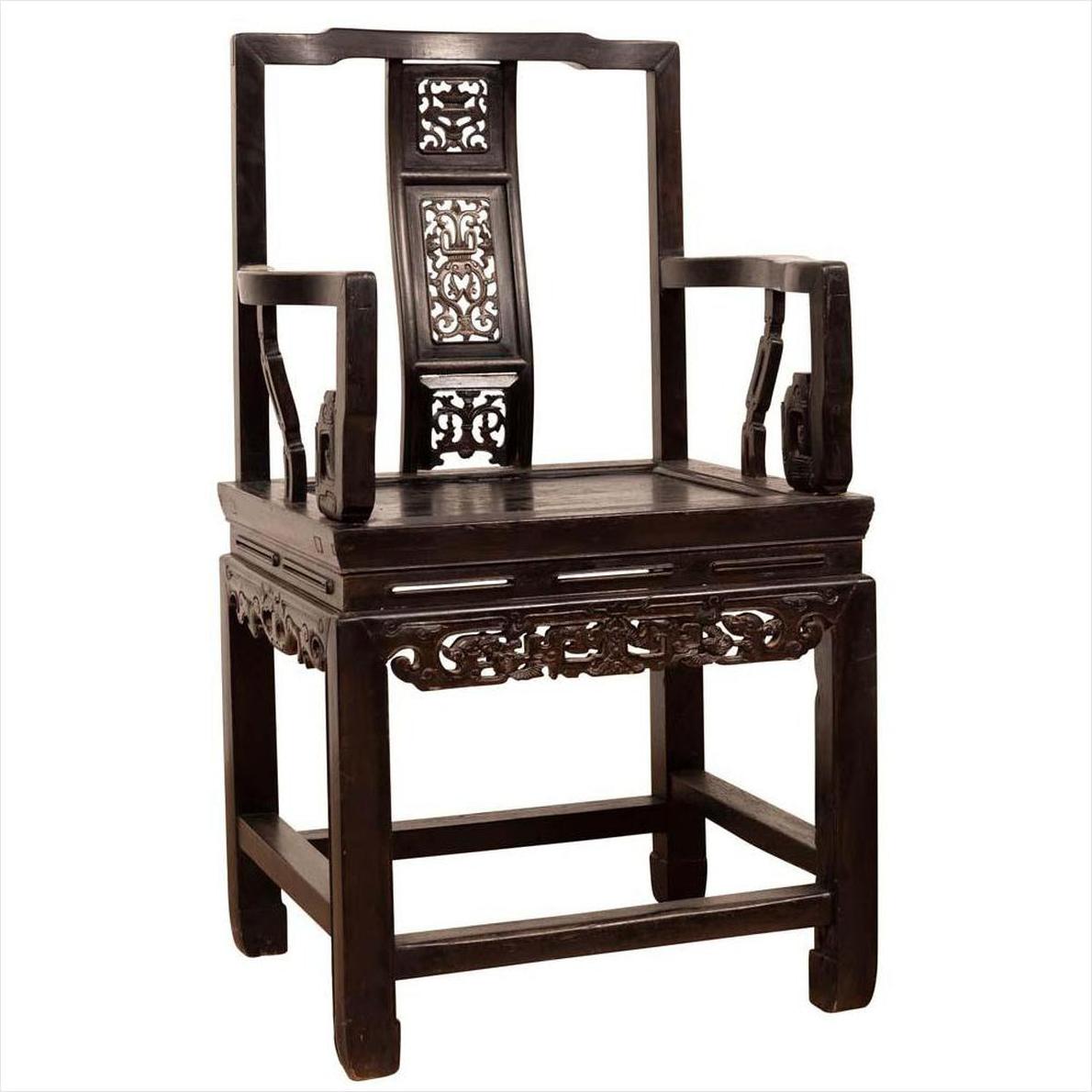 Dark wood Chinese wedding chair with curvy pierced splat and serpentine arms, traditional style, close-up view.