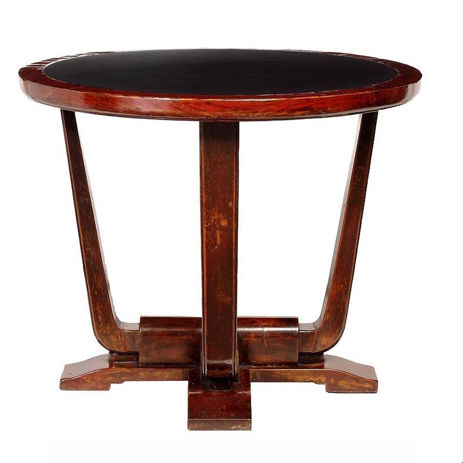 Dark Chinese Elmwood circular side table with angled legs, Art Deco style, close-up.