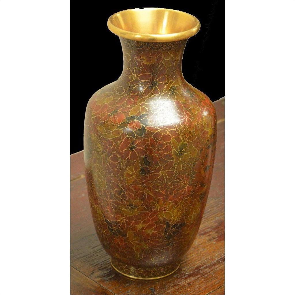 Brown and gold cloisonné vase with floral pattern on a wooden surface, handcrafted, tall.