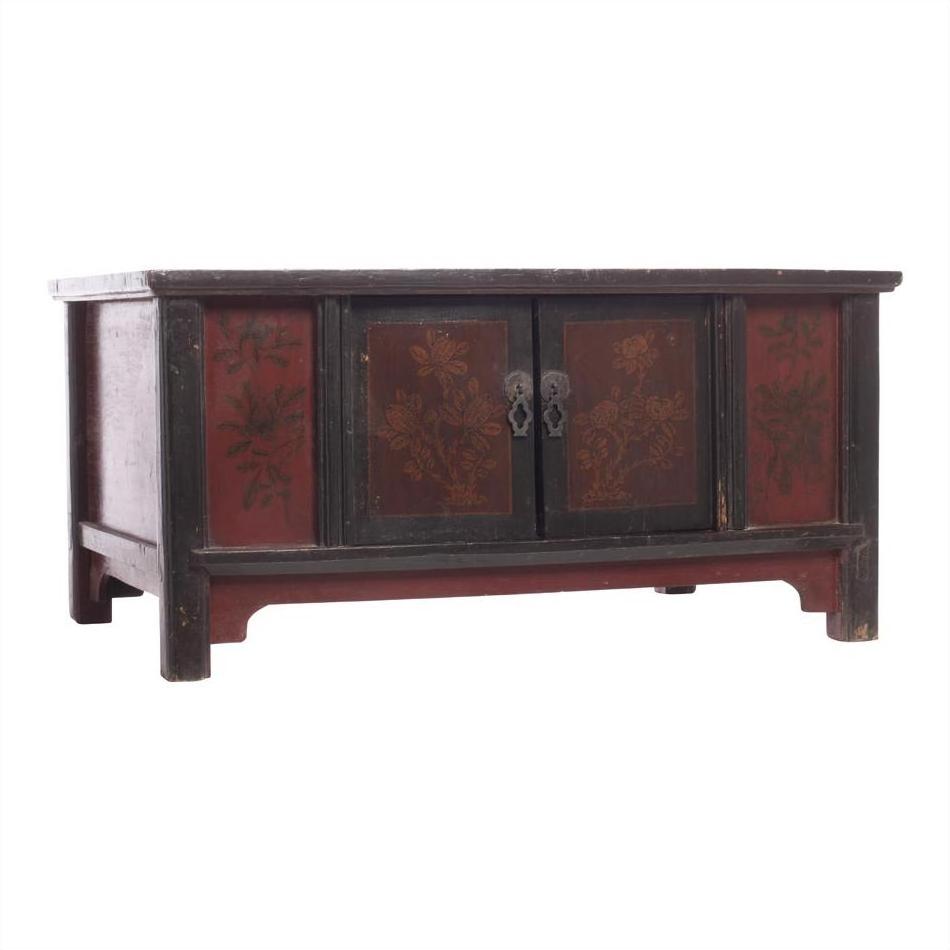 Red and black lacquer coffee table with floral designs, 2 doors, and short legs, front view.