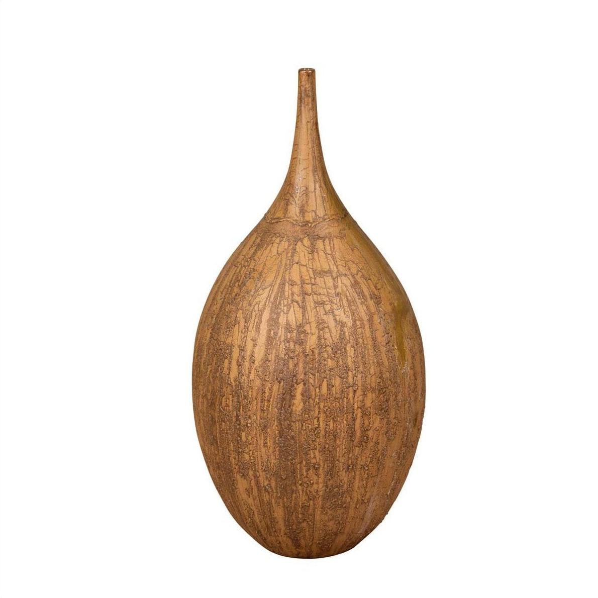 Mustard yellow and brown ceramic vase with textured surface and tapered spout, on plain background.