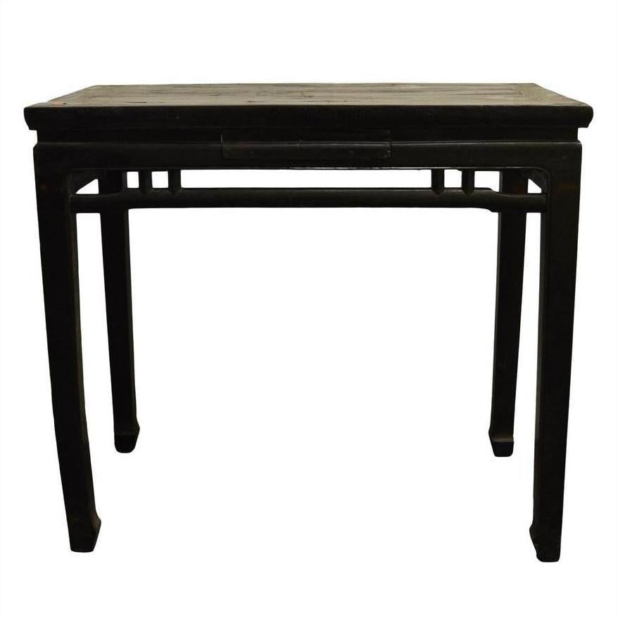 Dark stained wood altar table with straight legs and open friezes, set against a plain white background.