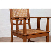 Dutch Colonial Javanese Teak Armchair with Rattan and Triglyph Inspired Motifs