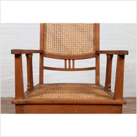 Dutch Colonial Javanese Teak Armchair with Rattan and Triglyph Inspired Motifs