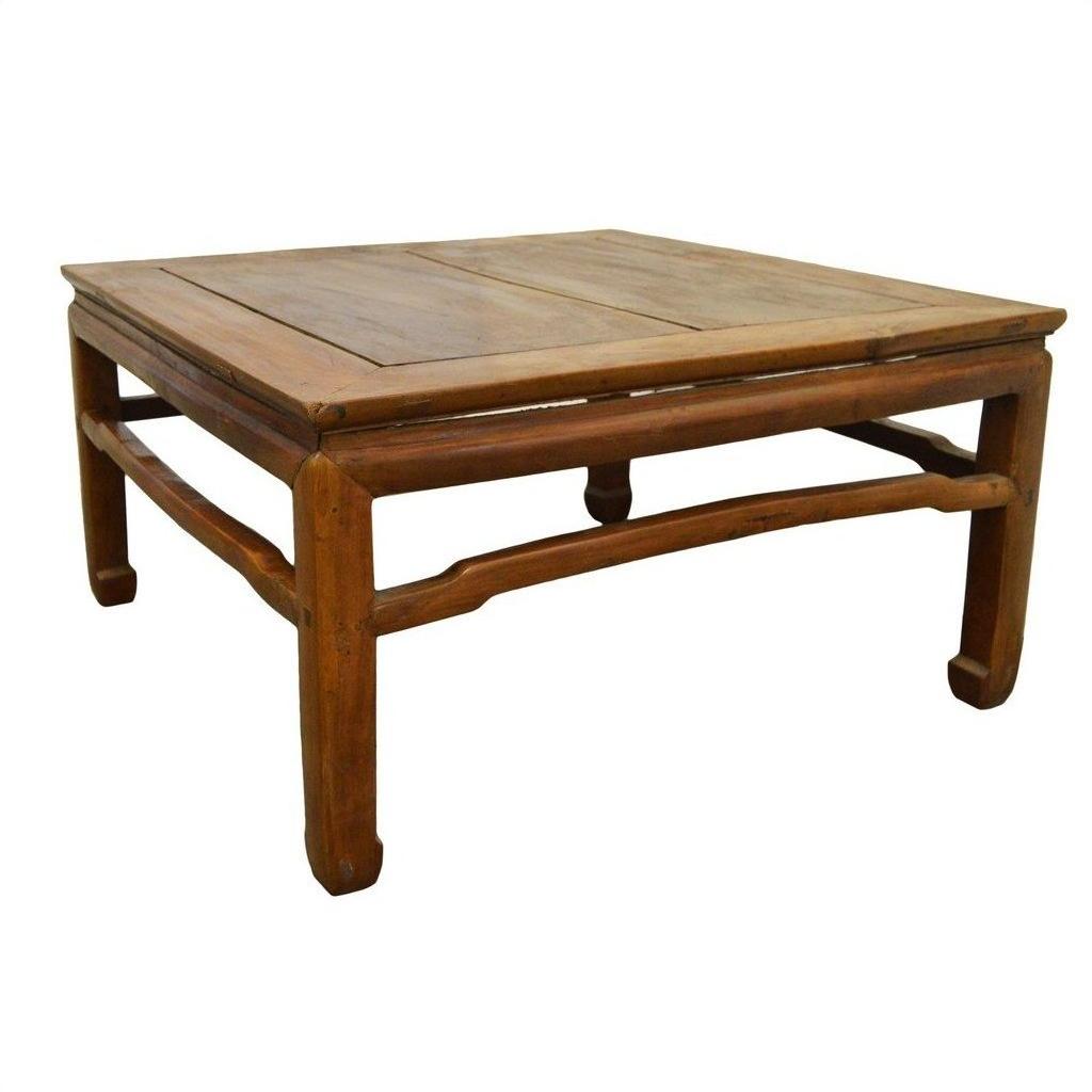 Brown elm wood square coffee table with sturdy legs and smooth surface, 19th-century style, on white background.
