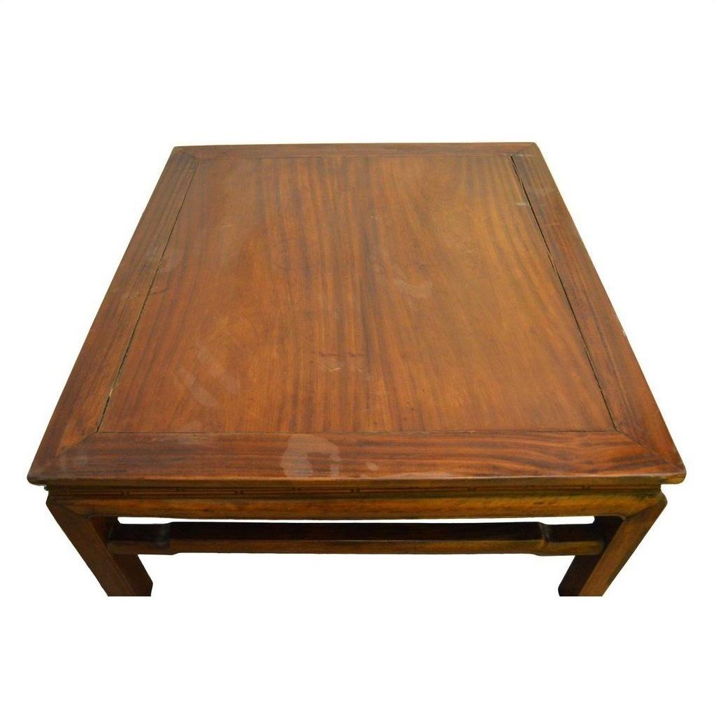 Brown Yumu wood rectangular coffee table, 19th-century, simple design, top view on white background.
