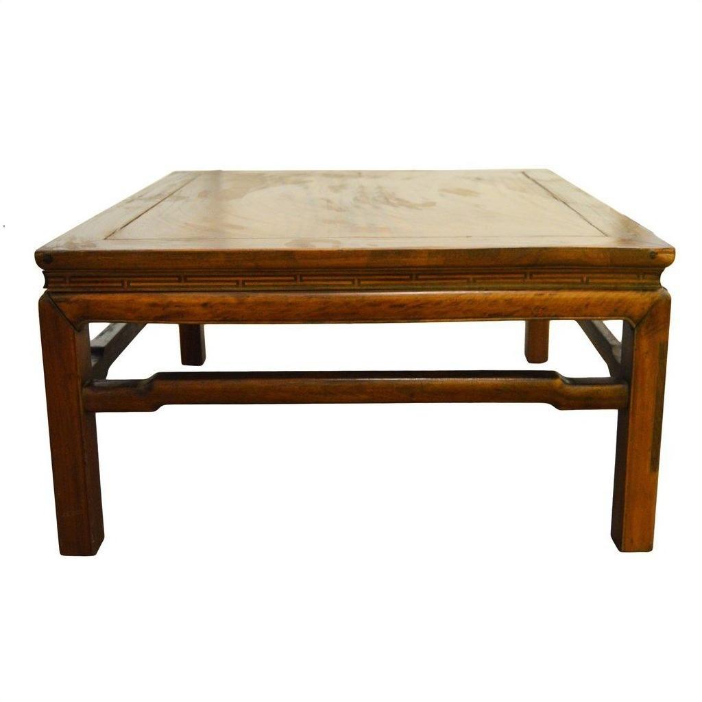 Brown Yumu wood coffee table with simple sturdy legs and smooth flat tabletop, shown on a white background.