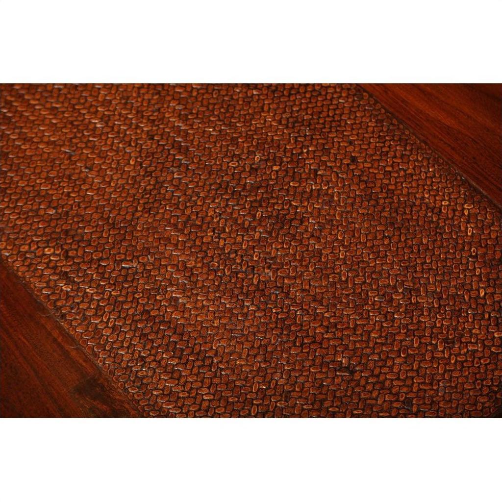 Close-up of brown elm wood table featuring a rattan mat top and smooth Chinese elm wood borders.