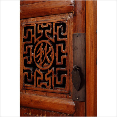 Fretwork And Carved Chinese Cabinet