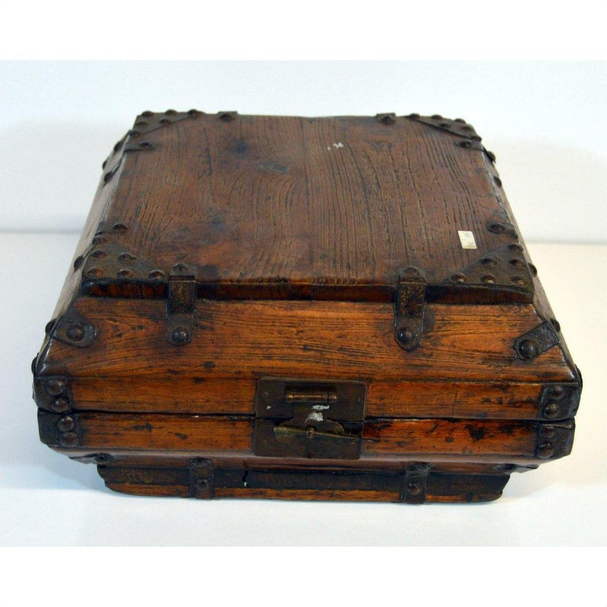 Brown wooden Chinese box with iron hardware and latch, displayed on a plain white background.