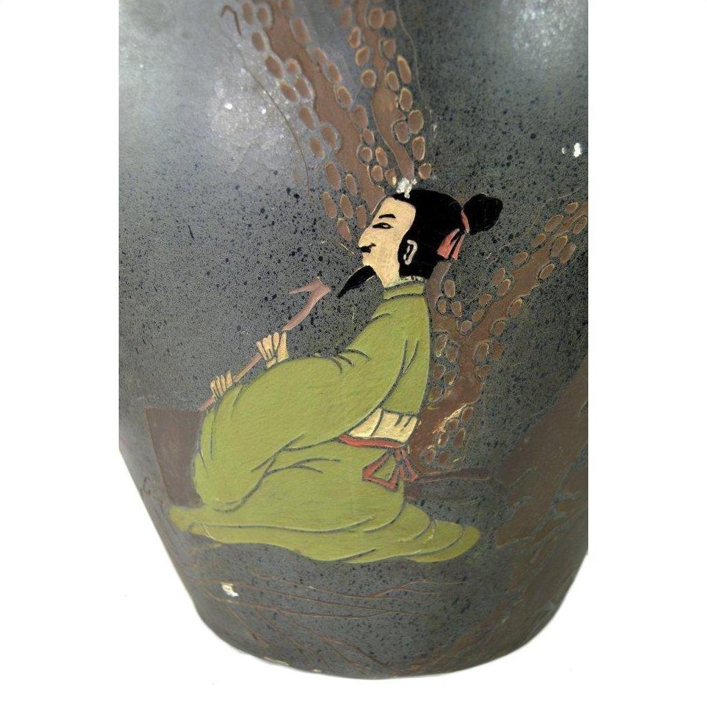 Large hand painted ceramic vase with figure in green robes, cross-legged holding a pipe, Hong Kong style.