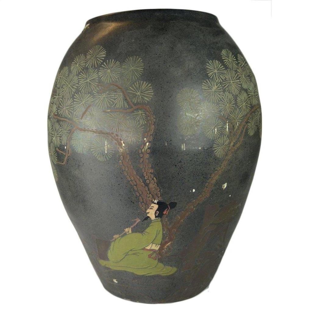 Large hand-painted ceramic vase with paint loss, features man in green robes playing flute under pine tree.