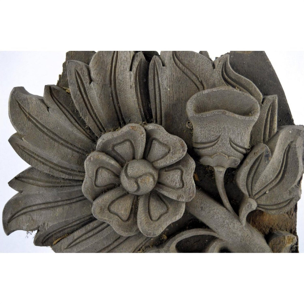 Brown wood plaque with hand-carved floral design, close-up view, measuring 9.5" x 8.5" x 1", good condition.