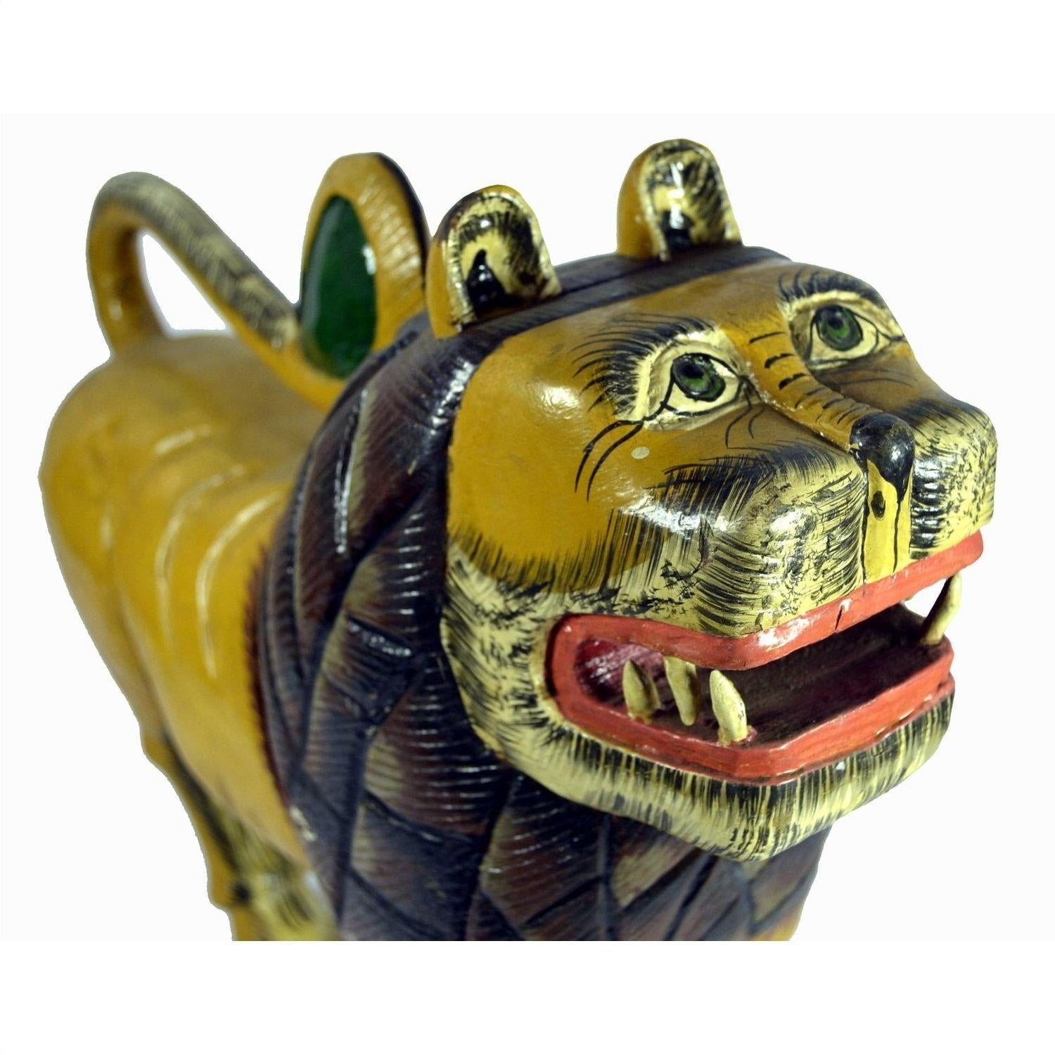 Brown painted wooden lion figurine with carved details, loose joints, open mouth, and wide eyes, close-up view.