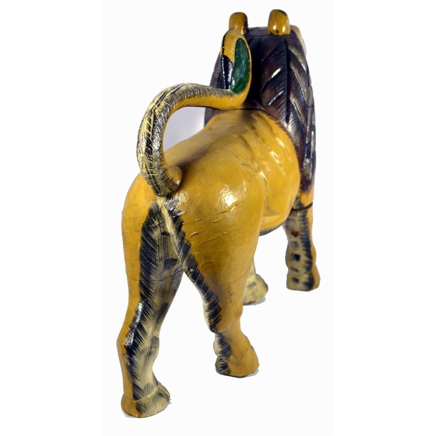 Yellow wood carved lion with dark mane and curly tail, rear view, 18 inch, good condition.