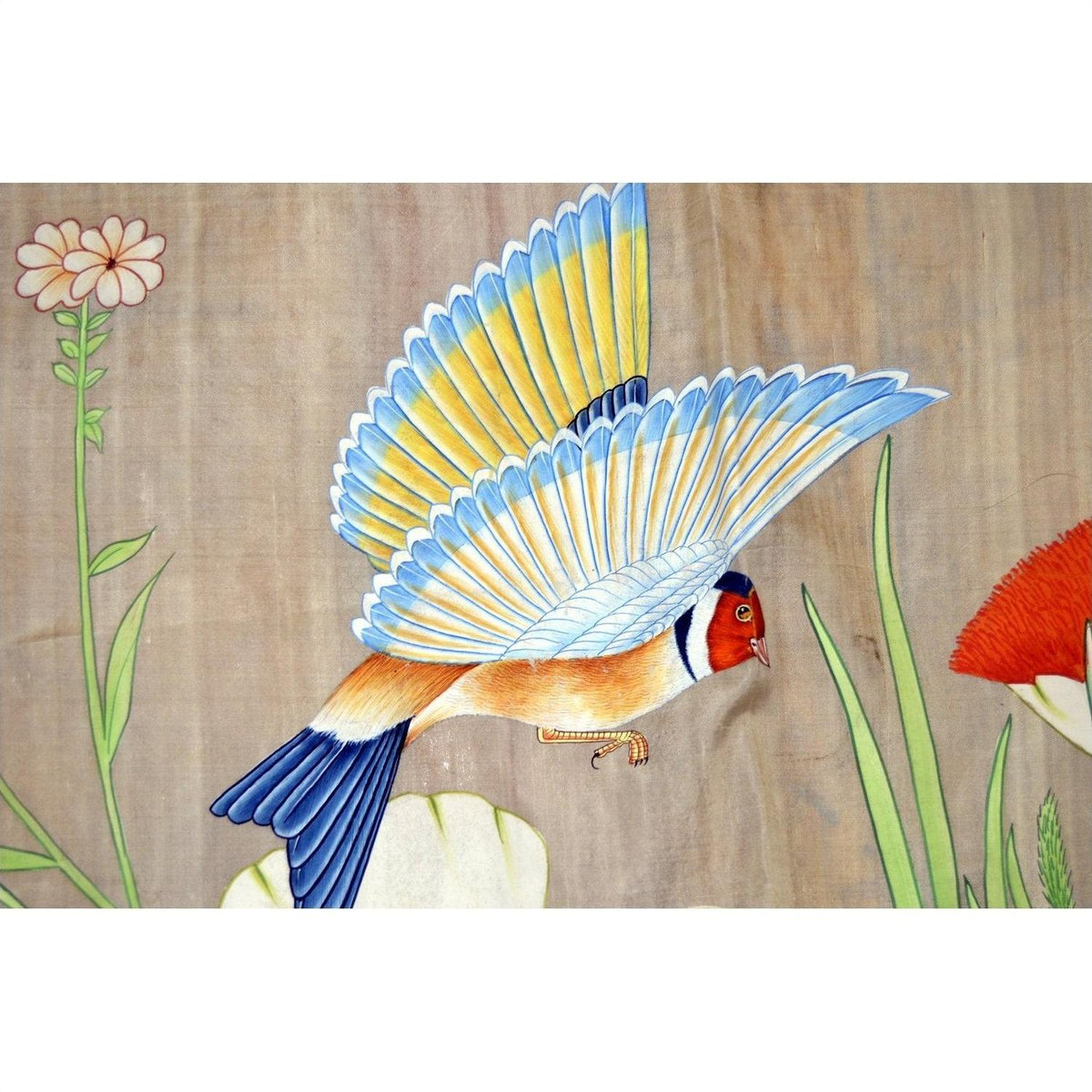 Colorful silk tapestry with bird showing light paint loss, among green plants and flowers.