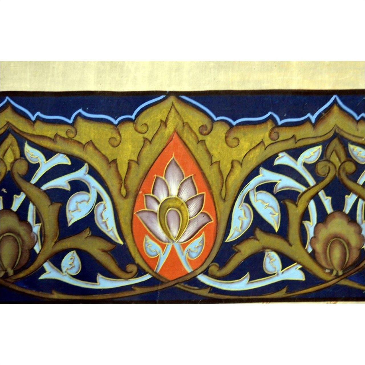 Blue and gold silk tapestry with ornate floral pattern, central lotus, and border design.