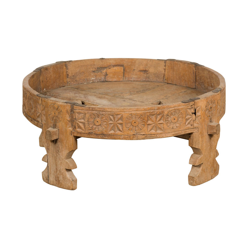 This-is-a-picture-of-a-Indian 1920s Teak Chakki Grinding Table with Hand-Carved Geometric Décor-image-position-1-style-YN7735-Shop-for-Vintage-and-Antique-Asian-and-Chinese-Furniture-for-sale-at-FEA Home-NYC