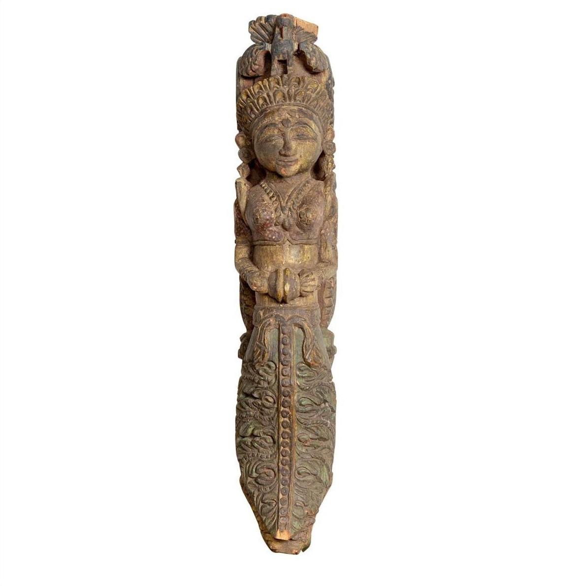 Close-up of an Indian antique polychrome wood statue of a celestial musician with ornate, vibrant painted details.