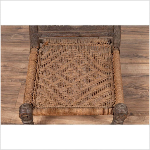 Indian Antique Rustic Low Seat Wooden Chair with Carved Rosettes and Rope Seat