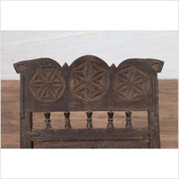 Indian Antique Rustic Low Seat Wooden Chair with Carved Rosettes and Rope Seat