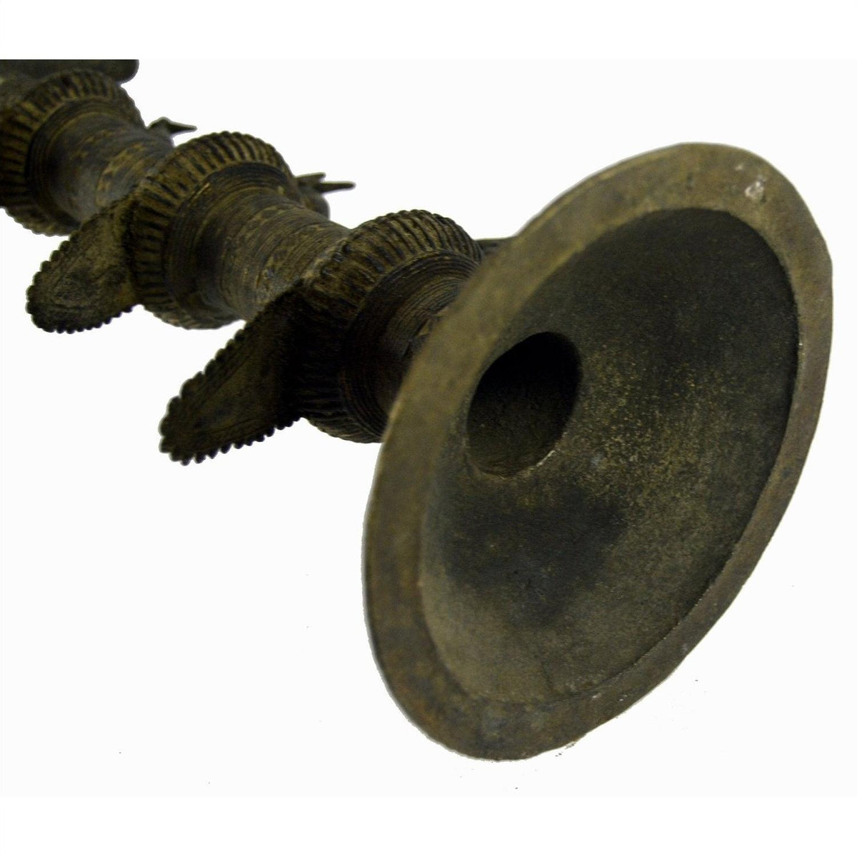 Close-up of brass Indian oil burner with flared 5 1/4 inch bell and decorative rings on the body.