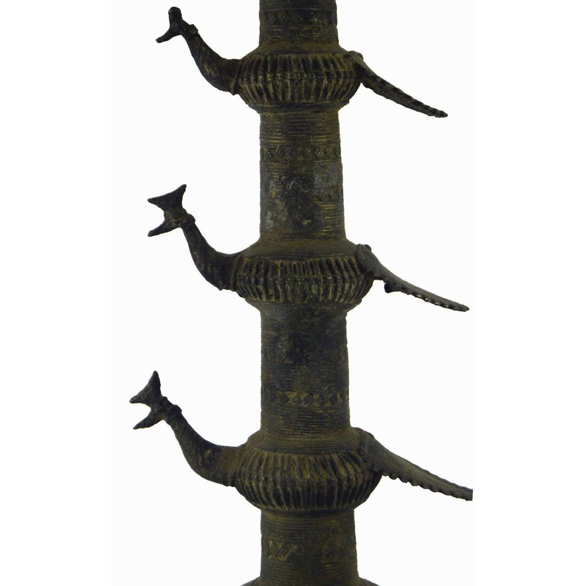 Close-up of a brass Indian oil burner, 13 inches tall, with three stylized animal figures extending from its side.