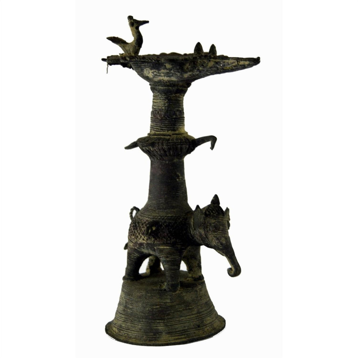 Brass Indian oil burner with intricate detailing, used as a collectible or decorative vase, close-up view.