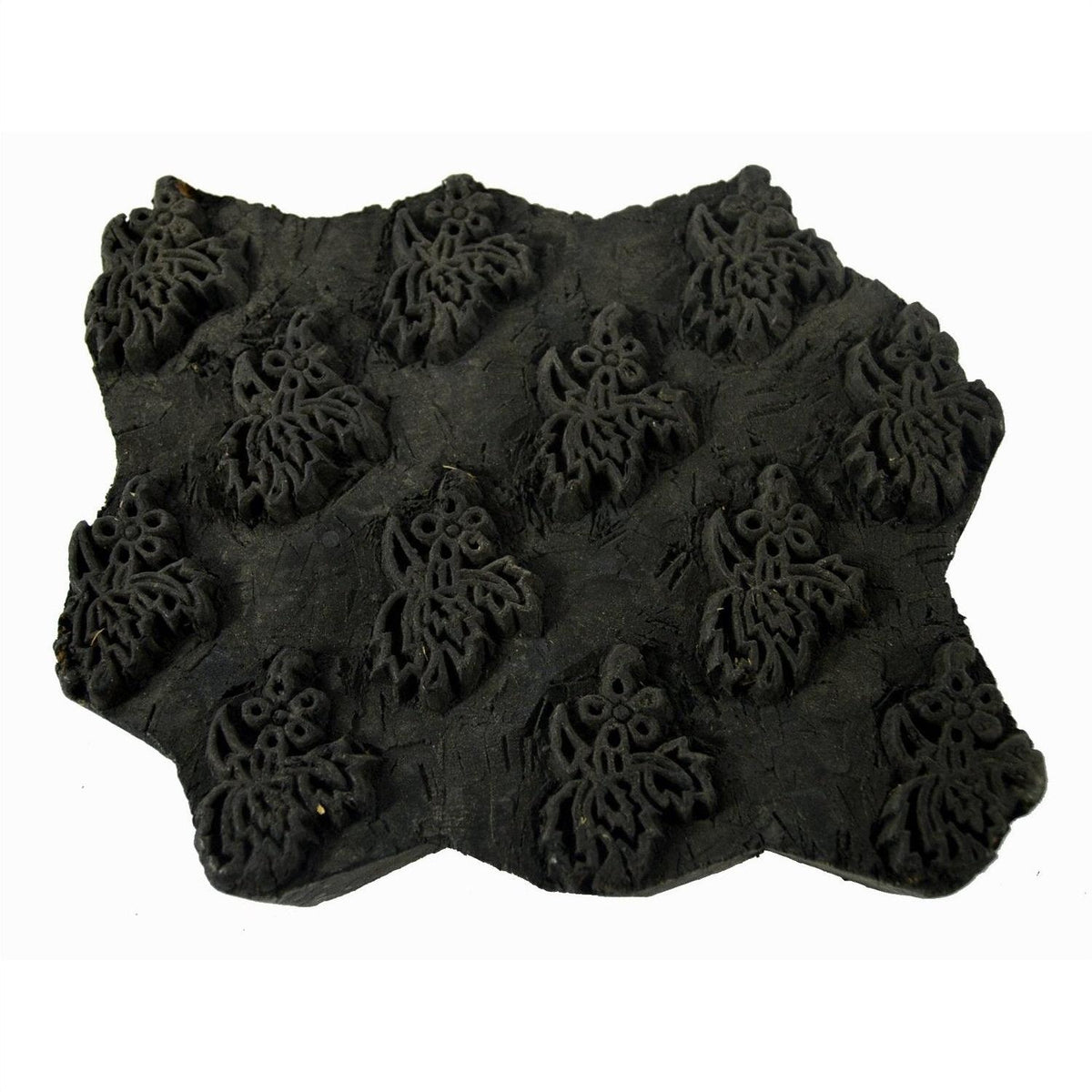 Brown wooden ink block with intricate floral pattern, close-up, suitable for 7-inch box, good condition.