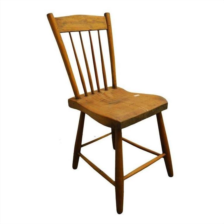 Brown wooden dining chair with slatted backrest and gently worn seat on a white background.