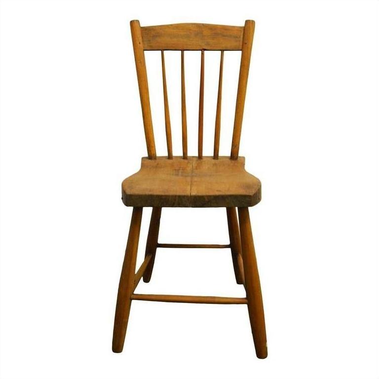 Natural wood Indonesian chair with curved seat and vertical slat backrest, front view on white background.