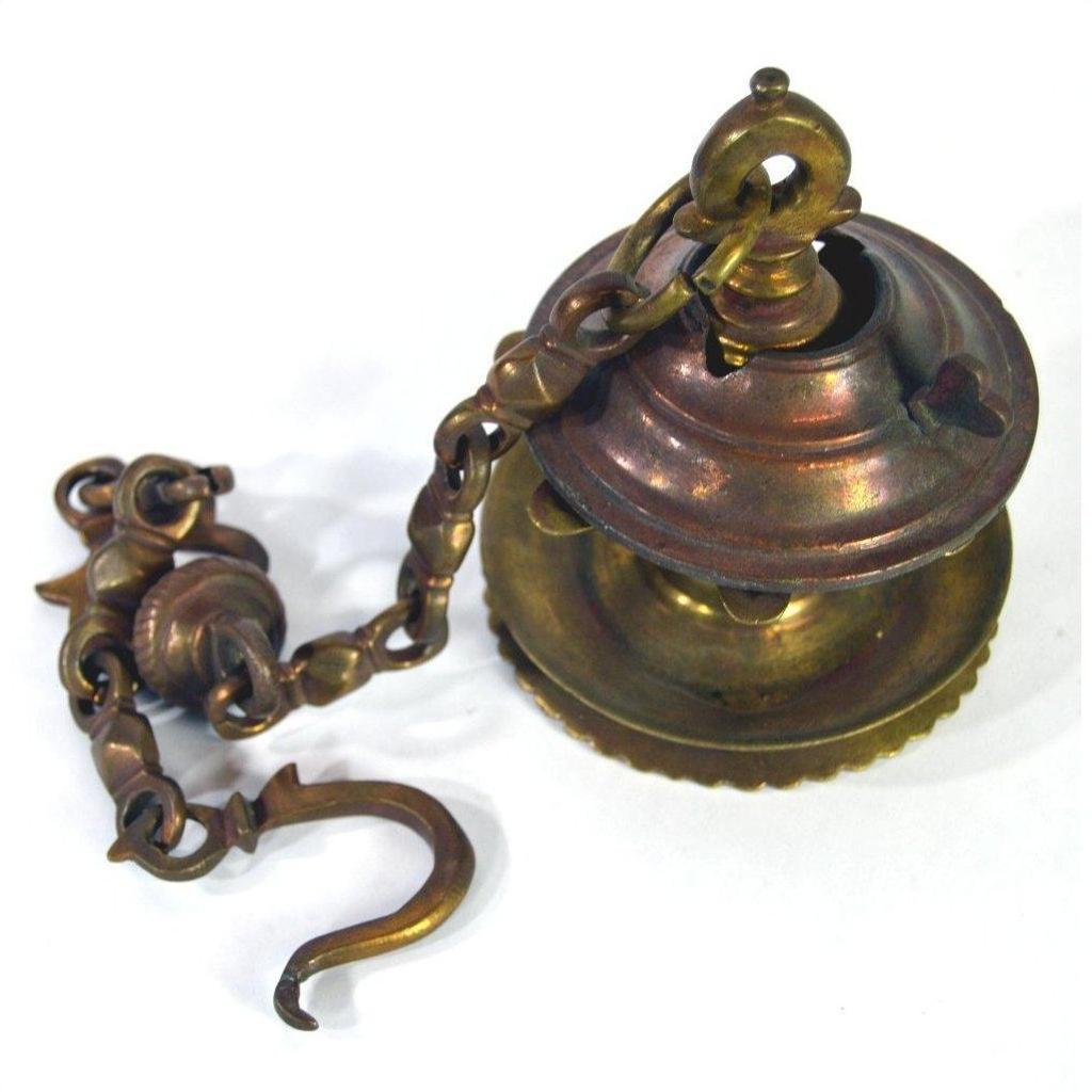 Brass Japanese temple incense burner with decorative lid and chain, 19 inches long, on white background.