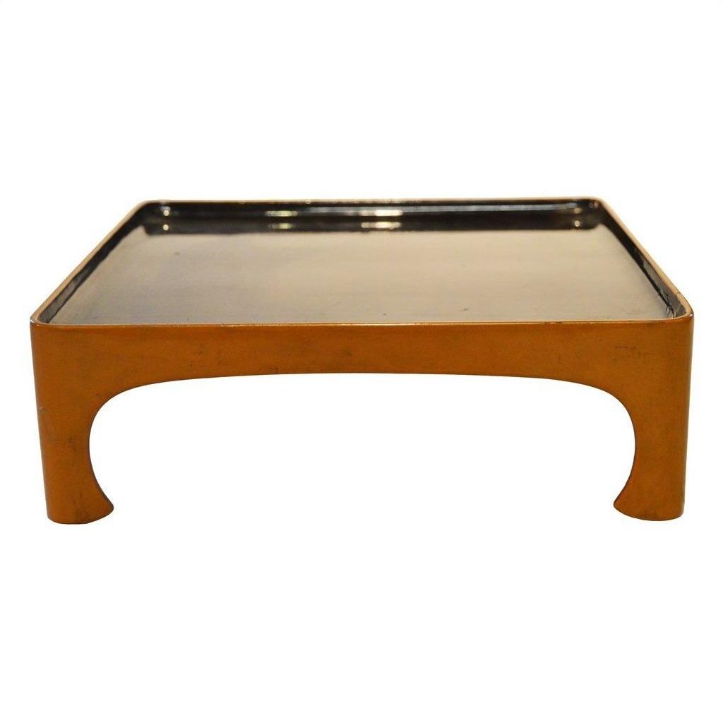 Glossy black and orange lacquered bamboo tea ceremony tray with curved legs, Taisho period, close-up.