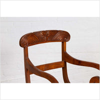 Javanese Antique Armchair with Carved Rail, Woven Rattan Seat and Curving Arms